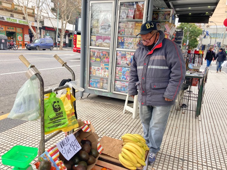 Roberto Bereche at his food stand in the Buenos Aires neighbourhood of Chacarita