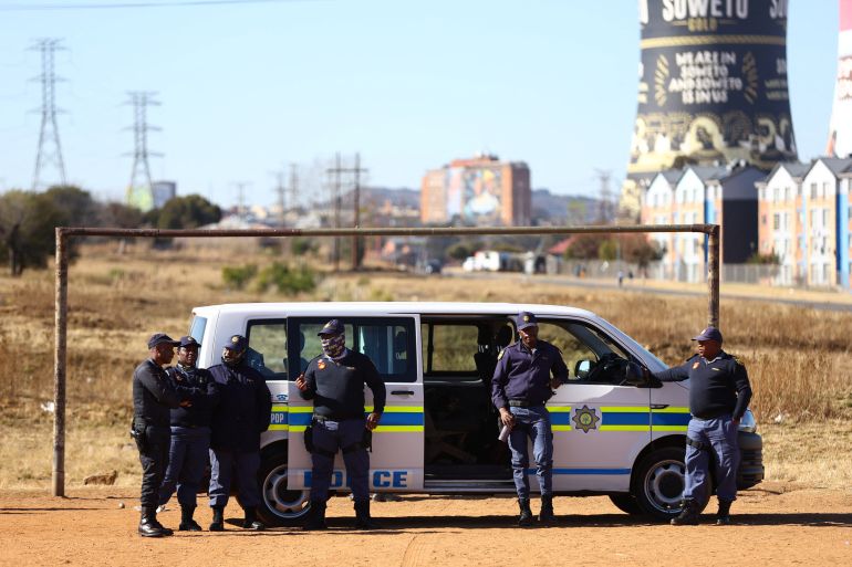 police and van at South Africa shooting