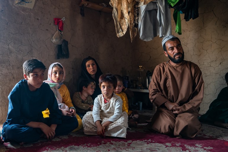 An Afghan family at the engagement of their young daughter