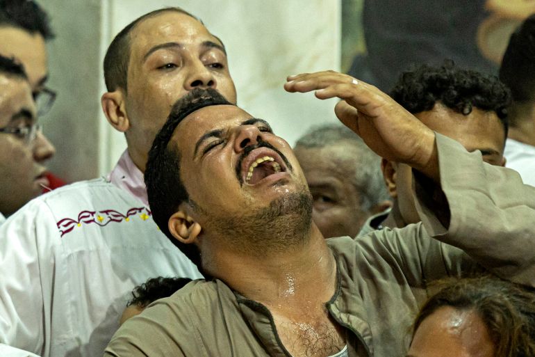 Egyptian mourners at the church of the Blessed Virgin Mary in Giza