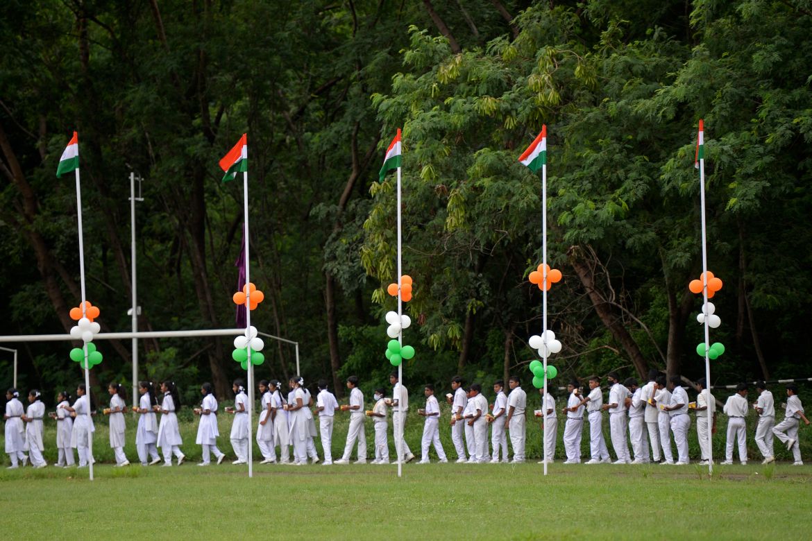 School students line up for a programme