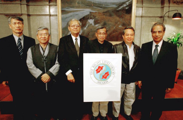 Walden Bello standing with other honorees after he was awarded the right livelihood award in 2003
