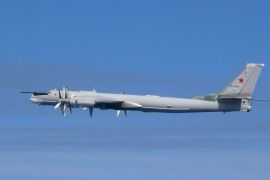 A Russian TU-95 bomber flies over East China Sea in this handout picture taken by Japan Air Self-Defence Force and released by the Joint Staff Office of the Defense Ministry of Japan