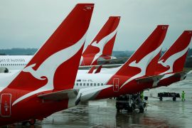 Qantas has agreed to compensate more than 86,000 customers who bought tickets for already cancelled flights in 2021 and 2022 [Phil Noble/Reuters]