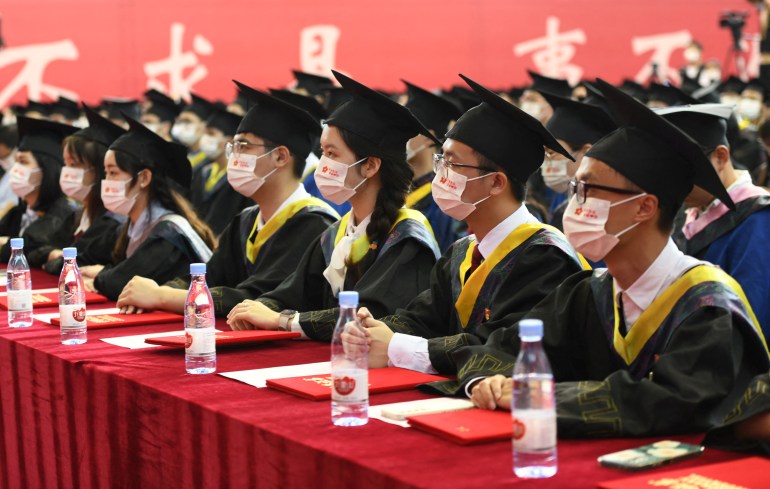Chinese graduates in gowns and hats