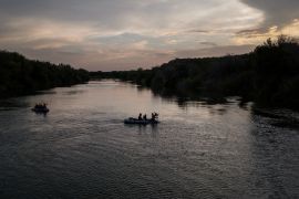 Smugglers use rafts to transport families across the Rio Grande river into the US from Mexico