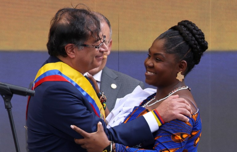 Colombia's Vice President Francia Marquez and Colombia's President Gustavo Petro hug during the swearing-in ceremony at Plaza Bolivar, in Bogota, Colombia.