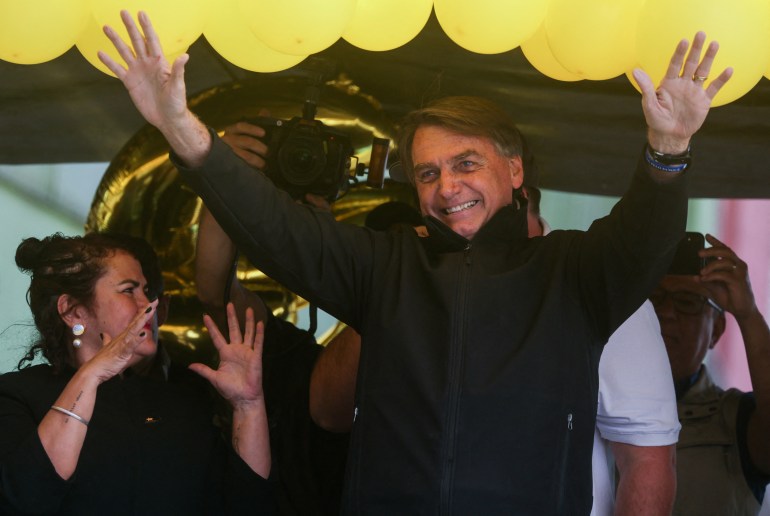 Jair Bolsonaro waves during first official presidential campaign rally in Brazil