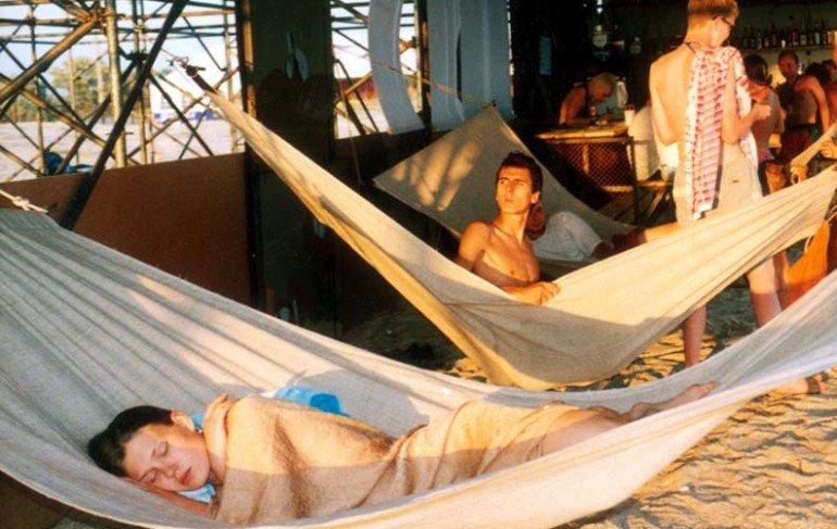 People at KaZantip snooze in hammocks