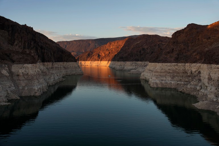 A bathtub ring of light minerals shows water line of Lake Mead near Hoover Dam