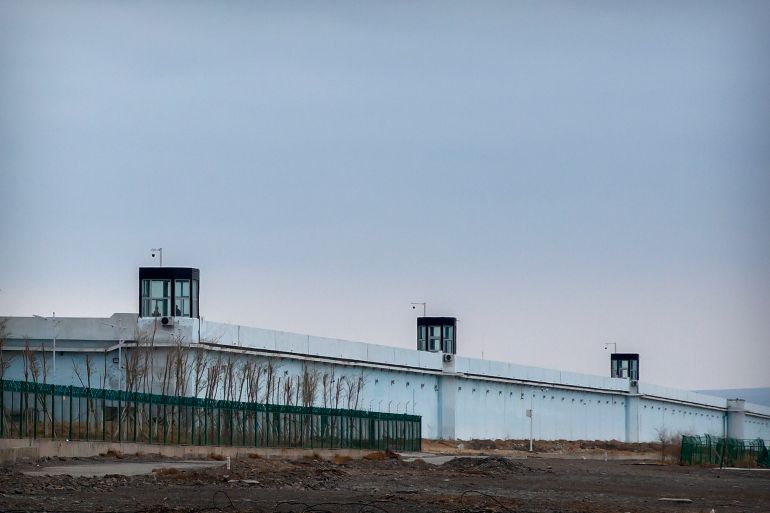 Guard towers stand on the perimeter wall of the Urumqi No. 3 Detention Center in Dabanchengin, part of western China's Xinjiang Uighur Autonomous Region.