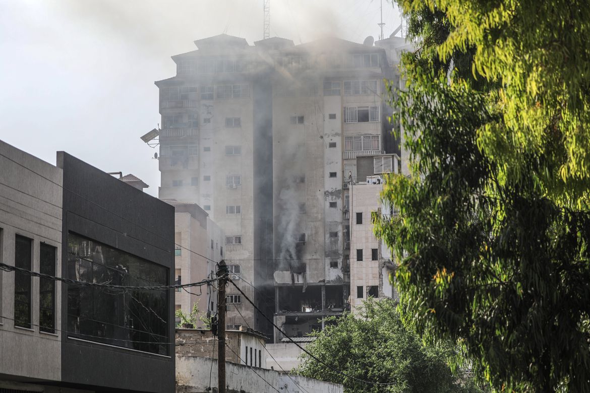 Smoke rises from a building after Israeli airstrikes in Gaza City.