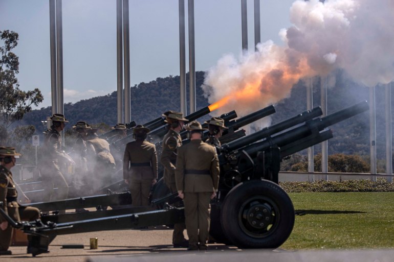 Members of the Australian Defence Force conduct a 21 gun salute during a Proclamation of Accession ceremony for Britain's King Charles III at Parliament House in Canberra on September 11, 2022.