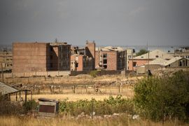 Low-rise apartment blocks and other buildings in the settlement of Sotk, which Armenia says was hit by shelling