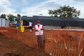 Members of Doctors without Borders set up an Ebola treatment unit in Uganda.