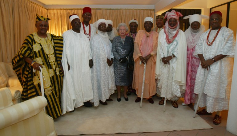 The Queen poses with with the Royal fathers of Nigeria during a reception in Abuja in 2003