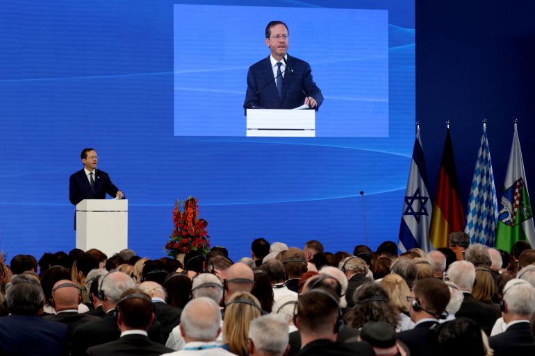 Israeli President Isaac Herzog speaks during Monday's commemoration ceremony