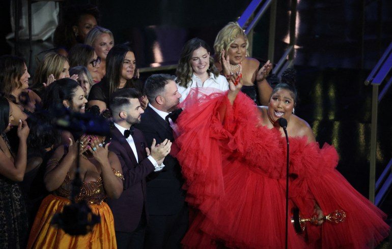 Lizzo and other cast members celebrate as she accepts the award for Outstanding Competition Program for "Lizzo's Watch Out for the Big Grrrls" at the 74th Primetime Emmy Awards held at the Microsoft Theater in Los Angeles, U.S., September 12, 2022. REUTERS/Mario Anzuoni TPX IMAGES OF THE DAY