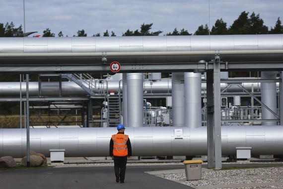 A security guard walks in front of the landfall facility of the Baltic Sea gas pipeline Nord Stream 2 in Lubmin, Germany.