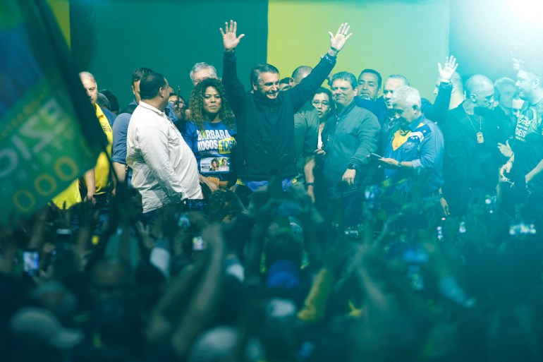 Brazil's President and candidate for re-election Jair Bolsonaro attends a campaign rally in Santos in Sao Paulo state, Brazil, September 28, 2022.