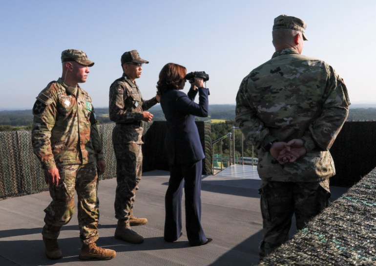 U.S. Vice President Kamala Harris stands at military observation post as she visits the demilitarized zone (DMZ) separating the two Korea