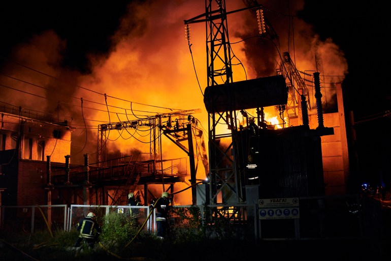 Ukrainian State Emergency Service firefighters put out the fire after a Russian rocket attack hit an electric power station in Kharkiv, Ukraine, Sunday, Sept. 11, 2022. The Kharkiv and Donetsk regions have been completely de-energised in the rocket attack. ([Kostiantyn Liberov/AP Photo]