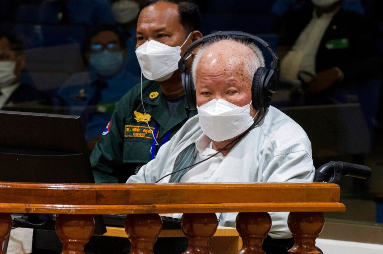 Khieu Samphan, (right), at the UN-backed war crimes tribunal in Phnom Penh, Cambodia, on Thursday, September. 22, 2022  [Nhet Sok Heng/Extraordinary Chambers in the Courts of Cambodia via AP]