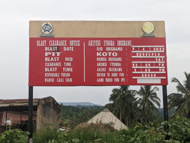 A signboard belonging to Segilola Resources Operating Limited (SROL), which runs a gold mine in Iperindo, Osun, the only commercial-scale gold mine in Nigeria. [Eromo Egbejule/Al Jazeera]
