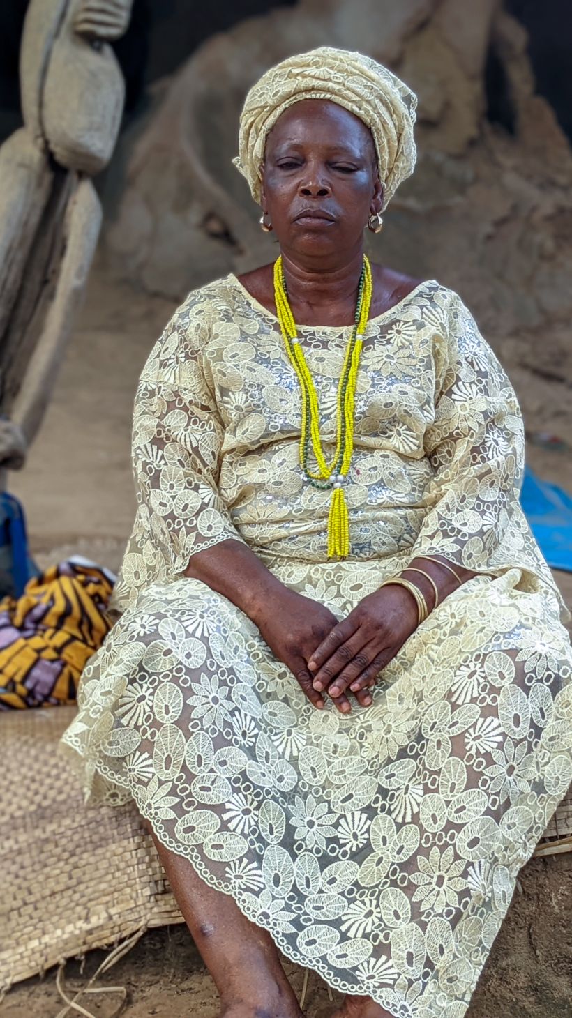 Osunyemi Efunsola, who has been chief priestess of Busanyin, a companion deity for Osun, for the last 25 years [Eromo Egbejule/Al Jazeera]