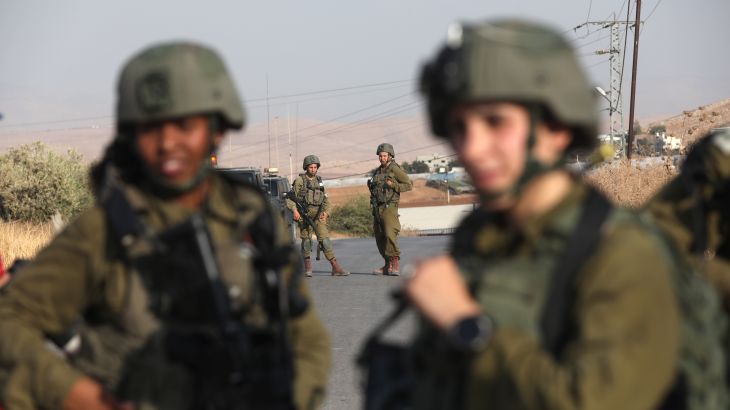 Israeli soldiers conduct a search operation at the area near Atof village south of Nablus city after the shooting attack at Israeli bus near the Jordan valley, 04 September 2022