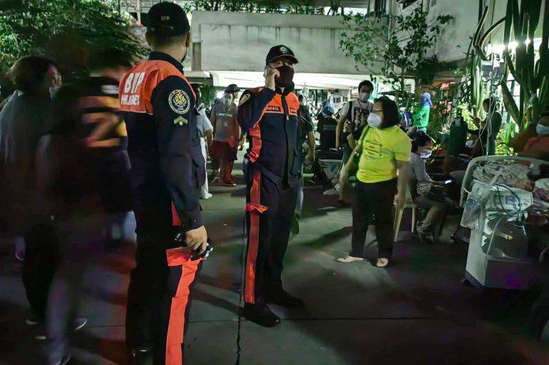 Rescue teams inspect the Mariano Marcos Memorial Hospital in Batac city, Ilocos Norte, Philippines.