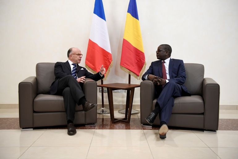 Chadian Prime Minister Albert Pahimi Padacke and then French Prime minister Bernard Cazeneuve (L) prior to a meeting in N'Djamena, Chad