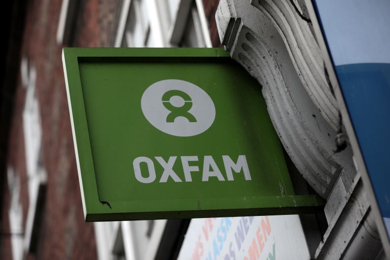 Green Oxfam sign with logo