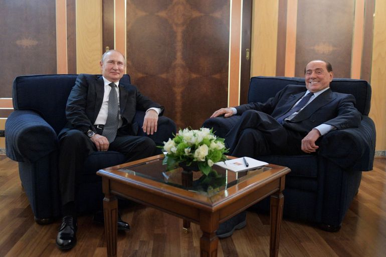 FILE PHOTO: Russian President Vladimir Putin meets with Italian Member of the European Parliament Silvio Berlusconi