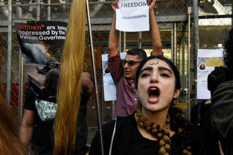 People participate in a protest against the Islamic regime of Iran and the death of Mahsa Amini in New York City, New York, U.S., September 27, 2022.