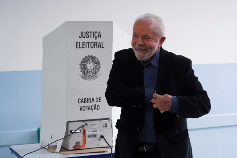 Brazil's former president and presidential candidate Luiz Inacio Lula da Silva votes at a polling station.