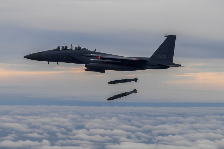 A South Korean fighter jet drops two bombs as part of a drill carried out on Tuesday.