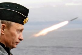 Russian President Putin watches the launch of a missile during naval exercises in Russia's Arctic North on board the nuclear missile cruiser Pyotr Veliky (Peter the Great) in 2005 [File: ITAR-TASS/Presidential Press Service via Reuters]