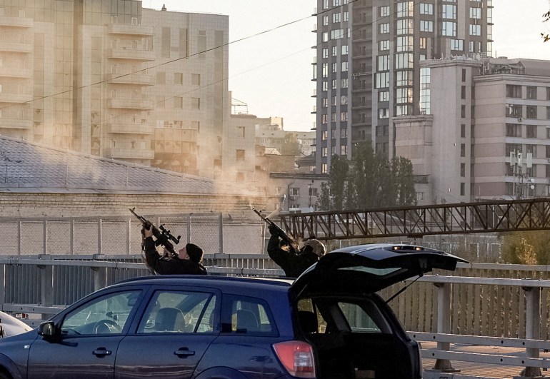 Two police officers shoot at drone targeting Kyiv.