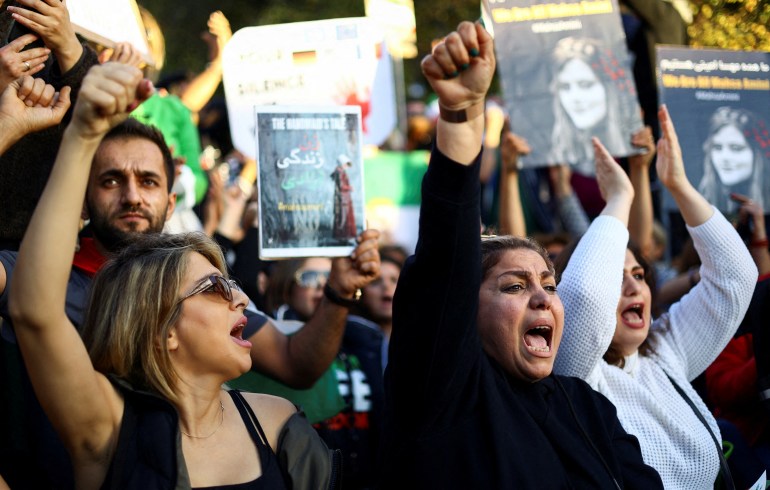 Demonstrators protest following the death of Mahsa Amini in Iran, in Berlin, Germany, October, 22, 2022.