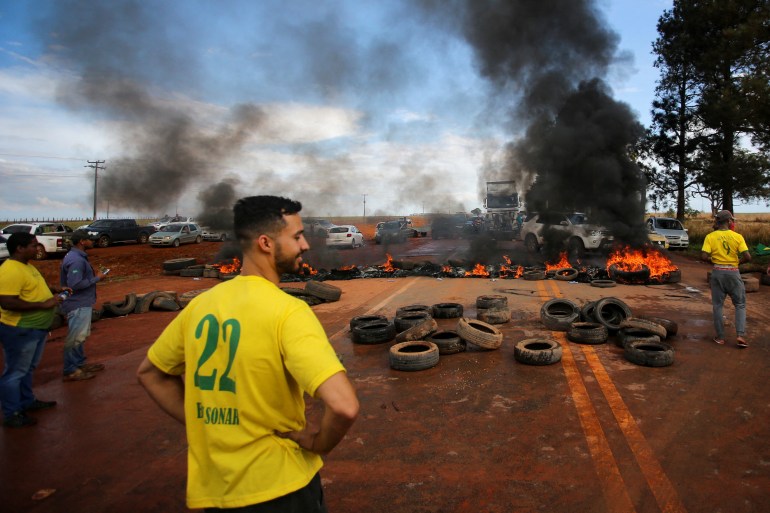 Supporters of Bolsonaro block roads