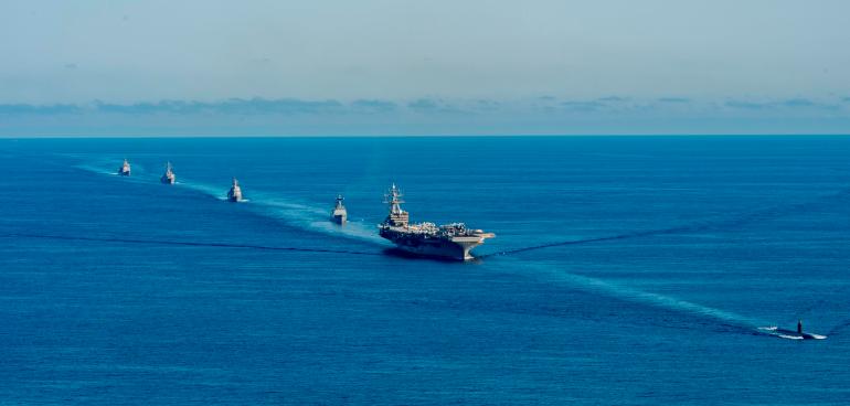 the USS Ronald Reagan aircraft carrier, second from right, participates in a joint anti-submarine drill among South Korea, the United States and Japan in waters off South Korea's eastern coast in South Korea