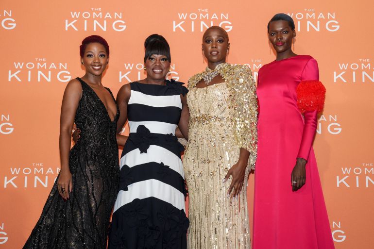 Thuso Mbedu, Viola Davis, Lashana Lynch and Sheila Atim pose for photographers on arrival for the UK Gala Screening of the film 'The Woman King' in London
