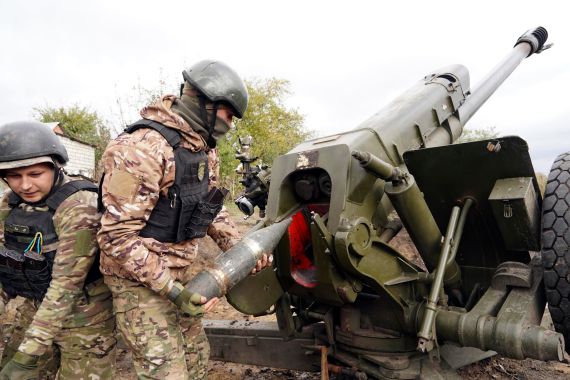 Ukrainian soldiers prepare artillery fire on the front line in the Kharkiv region, Ukraine.