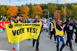 Amazon workers and supporters march during a rally in Castleton-On-Hudson in the US state of New York