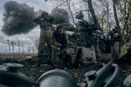 Ukrainian soldiers fire at Russian positions from a U.S.-supplied M777 howitzer in Ukraine's eastern Donetsk region