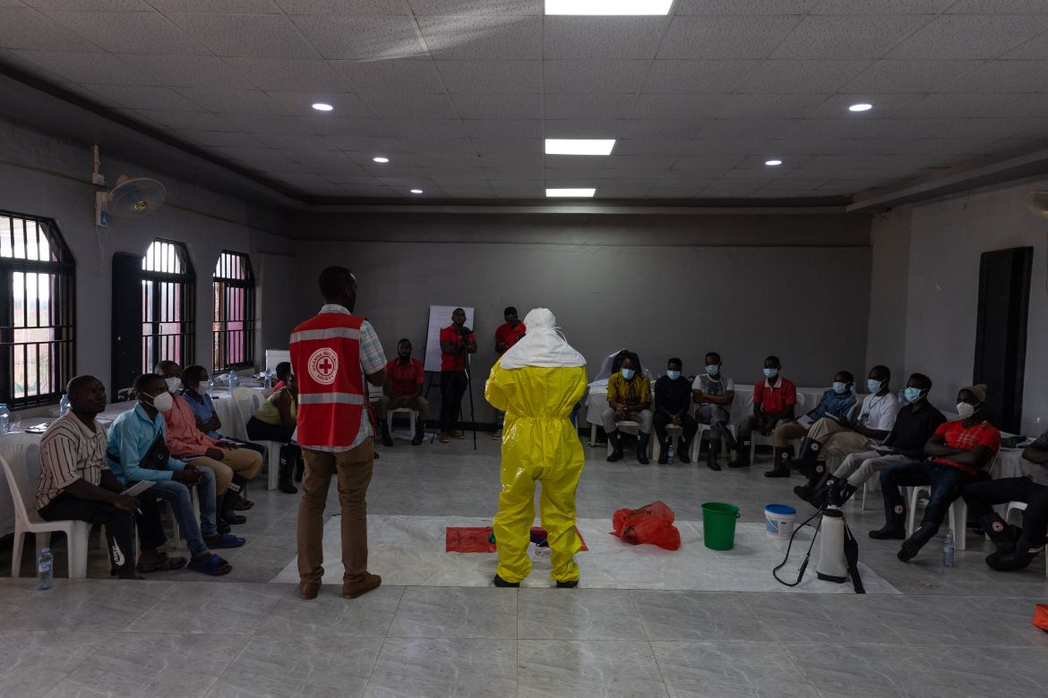 Volunteers receive training on how to conduct Safe and Dignified Burials of Ebola