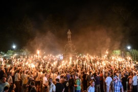 FILE PHOTO: FILE PHOTO: White nationalists participate in a torch-lit march on the grounds of the University of Virginia ahead of the Unite the Right Rally in Charlottesville, Virginia on August 11, 2017. Picture taken August 11, 2017. REUTERS/Stephanie Keith/File Photo/File Photo