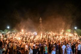White nationalists participate in a torch-lit march on the grounds of the University of Virginia ahead of the Unite the Right Rally in Charlottesville, Virginia on August 11, 2017. Robert Rundo, the founder of Active Clubs, was arrested after the rally alongside three other leaders from his previous group, Rise Above Movement [Stephanie Keith/File Photo/File Photo/Reuters]