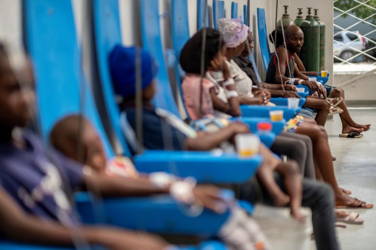 Patients receive treatment for cholera at the Gheskio Center Hospital in Port-au-Prince, Haiti.